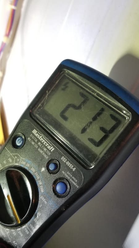 Multimeter used during an appliance diagnostic